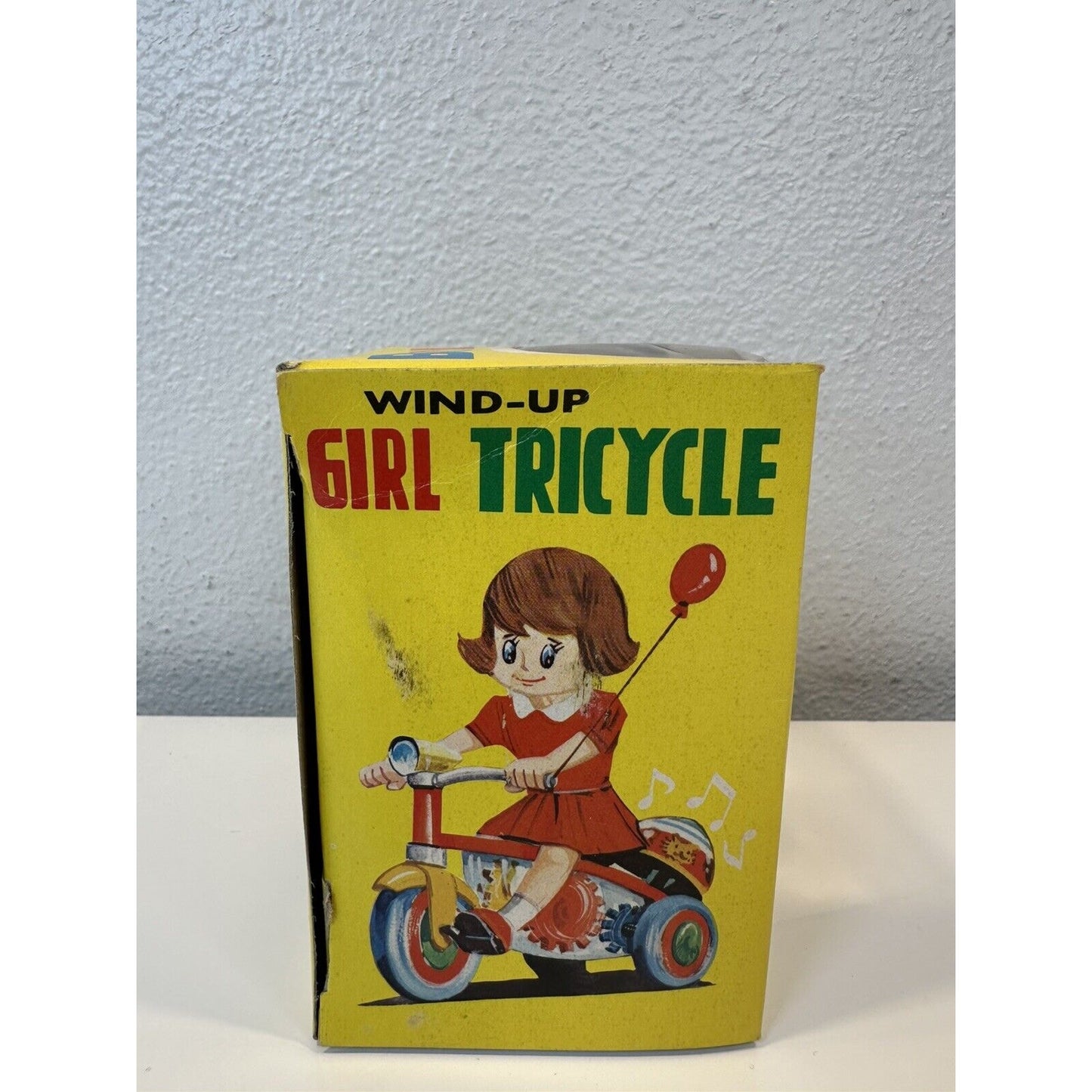 VINTAGE *NEW* 1960's Girl Trycicle Wind-up Toy w/Balloon