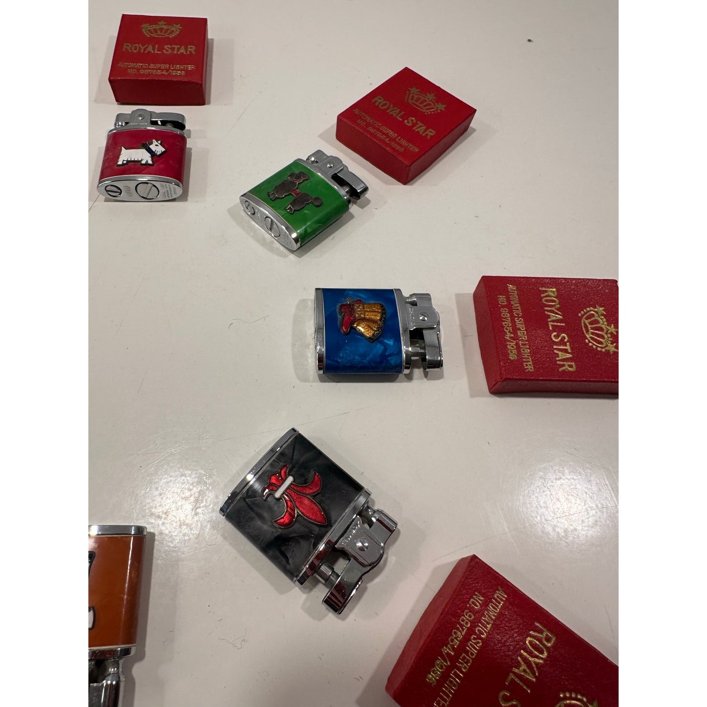 VINTAGE *NEW* 1956 ROYAL STAR Lighter Collection Set of 8