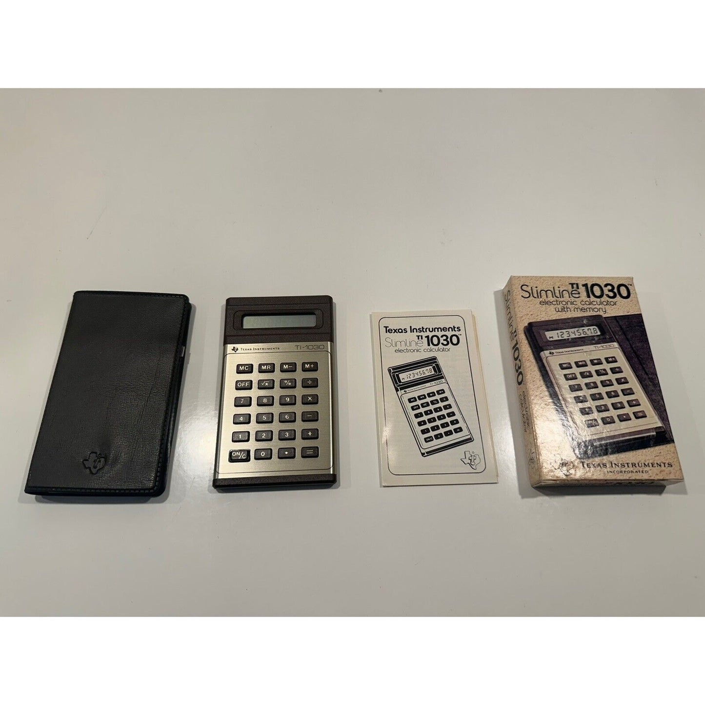 VINTAGE *NEW* Texas Instruments Slimline TI-1030 Calculator