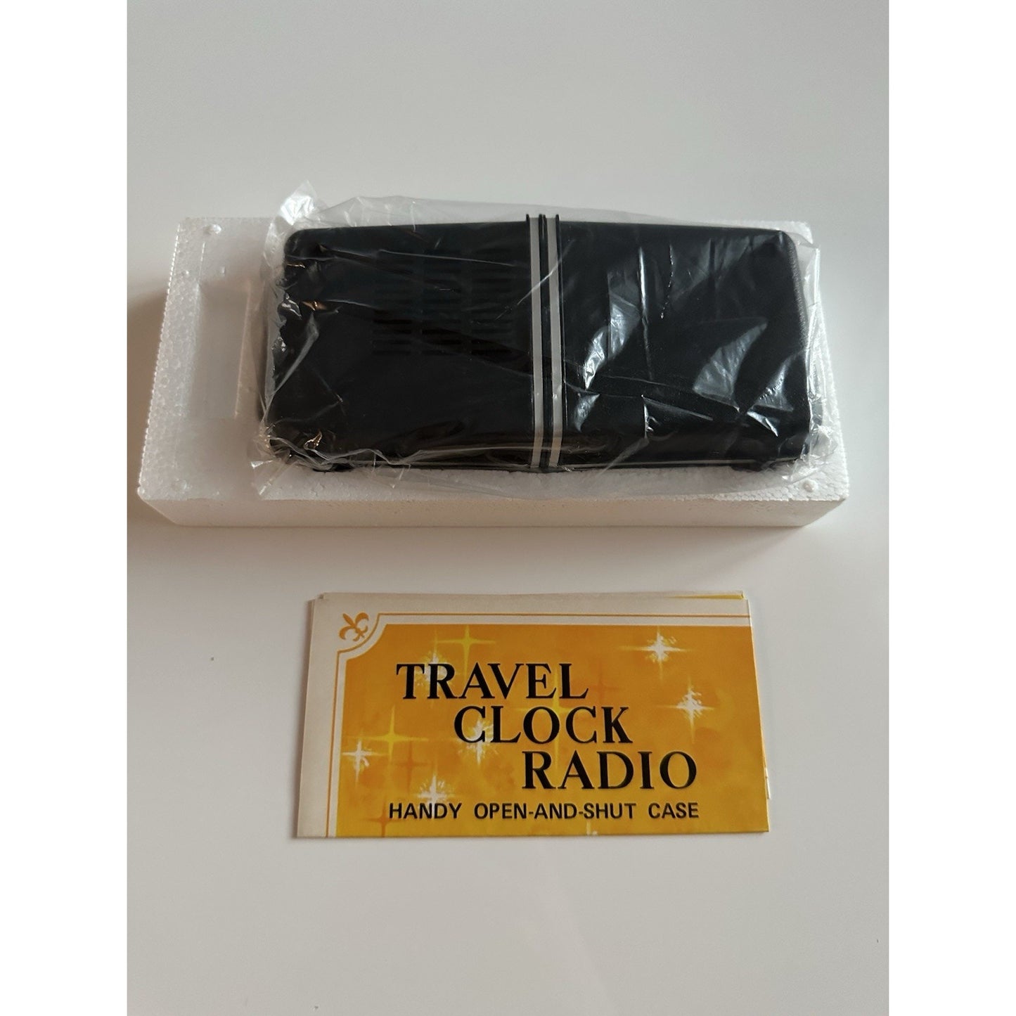 VINTAGE *NEW* 1960's/1970's Travel Clock Radio, Open/Shut Black Case