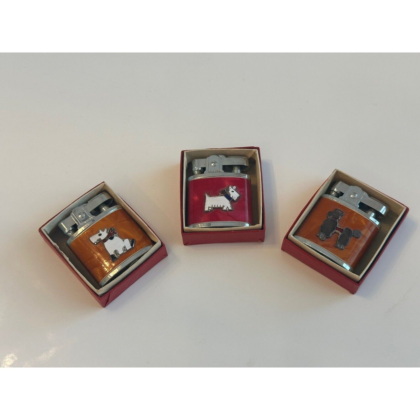 VINTAGE *NEW* 1956 ROYAL STAR Lighter Dog Collection