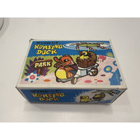 VINTAGE *NEW* 1960's Wind Up Nursing Duck with Baby under Parasol