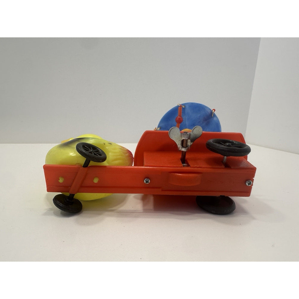 VINTAGE *NEW* 1960's Wind Up Nursing Duck with Baby under Parasol